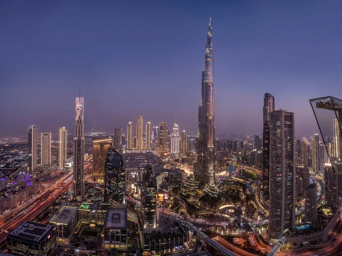 Burj Khalifa and the Downtown Dubai skyline at dusk