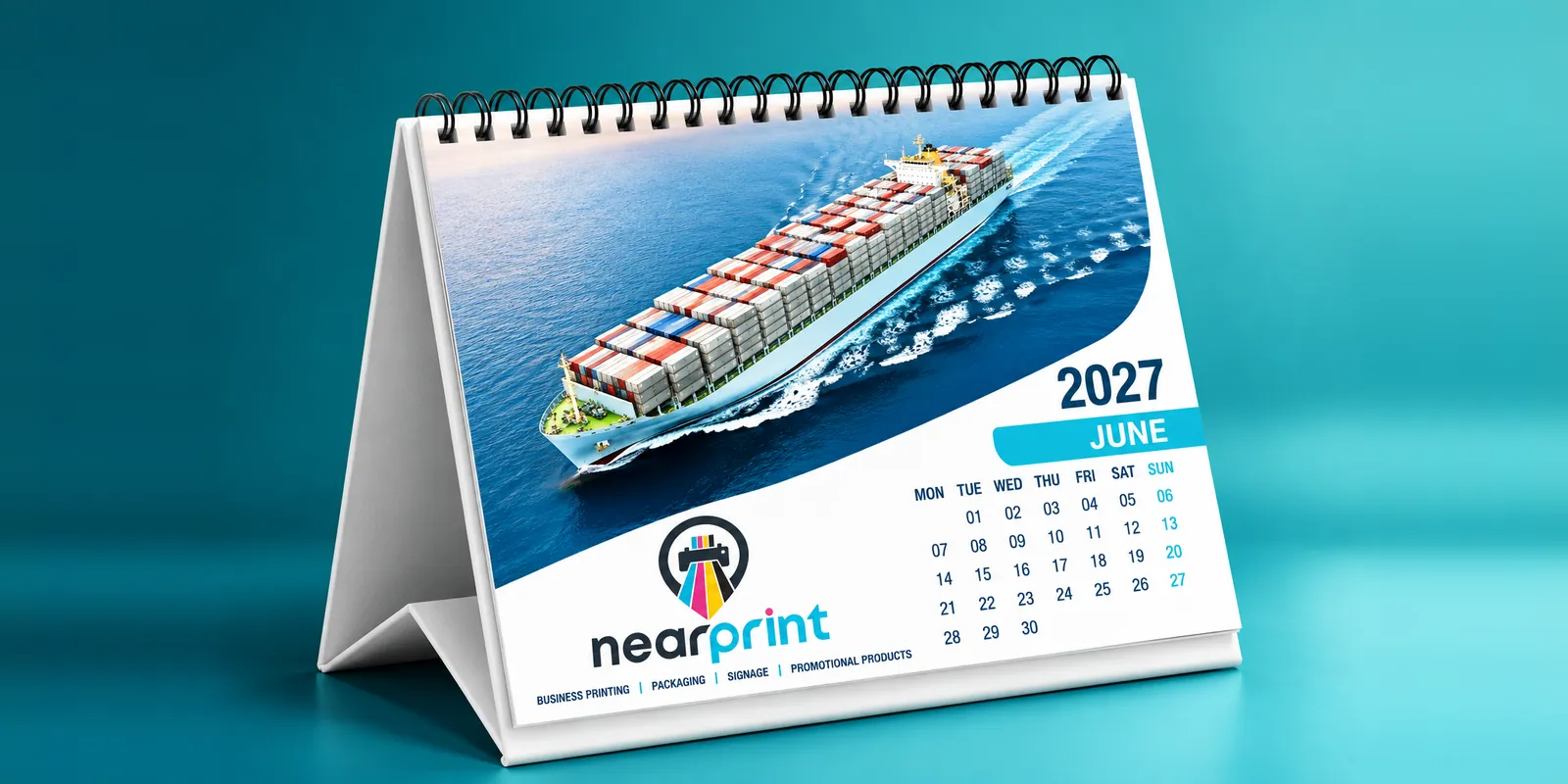 NearPrint branded 2027 desk calendar showing June with a cargo ship photo