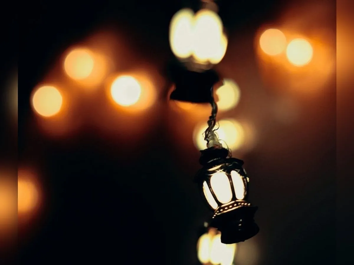 Hanging Ramadan lanterns glowing at night